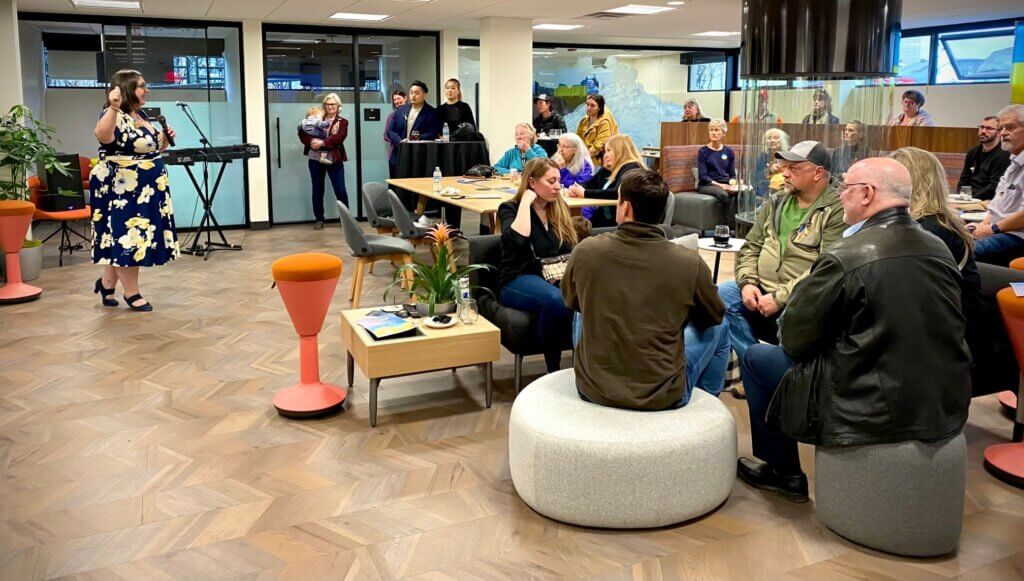 Members gathering in the Fire Floor event space at Cowork by RSD in Anchorage